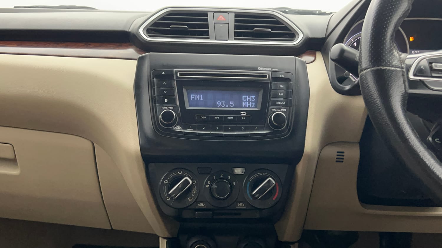Used 2019 Maruti Suzuki Dzire VXi Petrol Manual top_features Integrated (in-dash) music system