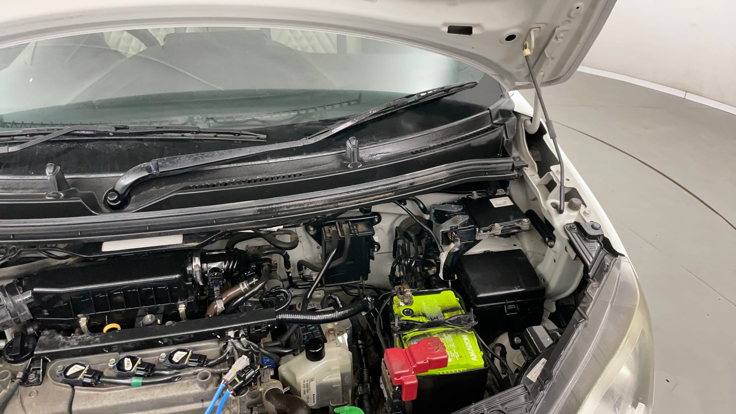 Used 2021 Maruti Suzuki Wagon R 1.0 VXi (O) 1.0 AMT Petrol Automatic engine ENGINE LEFT SIDE HINGE & APRON VIEW