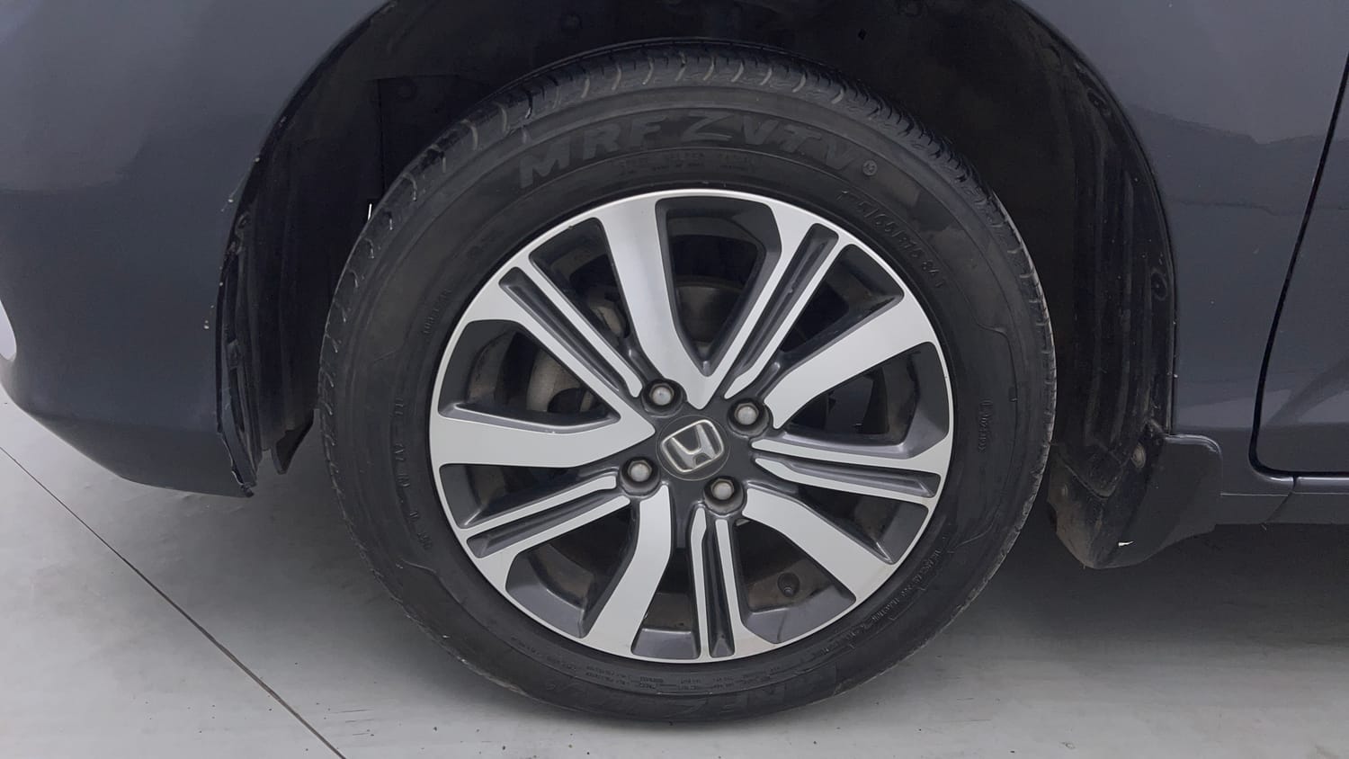 Used 2023 Honda Amaze VX CVT 1.2 Petrol Petrol Automatic tyres LEFT FRONT TYRE RIM VIEW