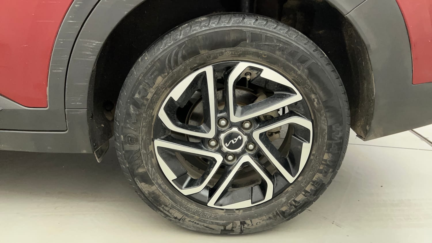 Used 2023 Kia Carens Prestige Plus 1.4 Petrol MT 7 STR Petrol Manual tyres LEFT REAR TYRE RIM VIEW