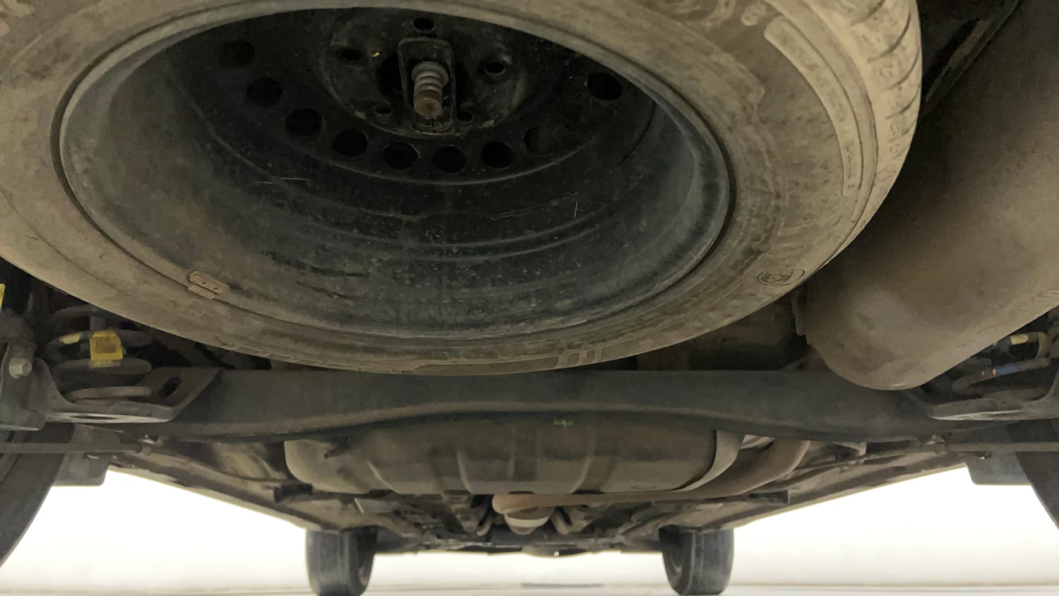 Used 2023 Kia Carens Prestige Plus 1.4 Petrol MT 7 STR Petrol Manual extra REAR UNDERBODY VIEW (TAKEN FROM REAR)