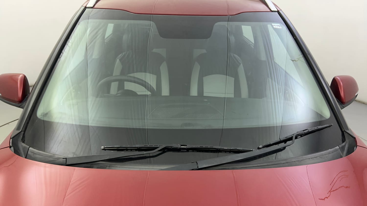 Used 2023 Kia Carens Prestige Plus 1.4 Petrol MT 7 STR Petrol Manual exterior FRONT WINDSHIELD VIEW