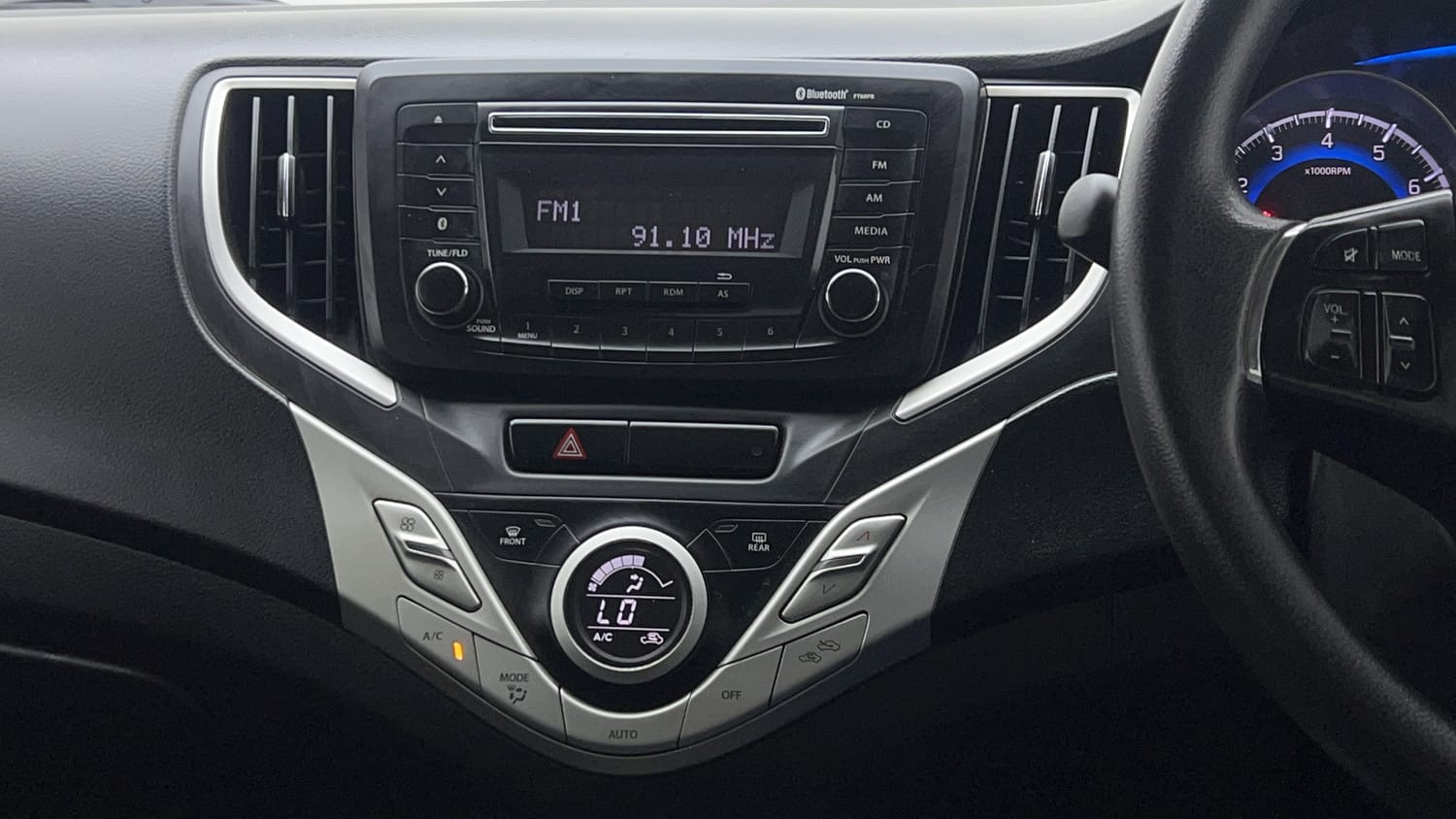 Used 2017 Maruti Suzuki Baleno Delta 1.2 Petrol Manual interior MUSIC SYSTEM & AC CONTROL VIEW