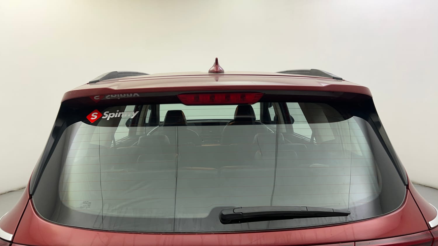 Used 2023 Kia Carens Prestige Plus 1.4 Petrol MT 7 STR Petrol Manual exterior BACK WINDSHIELD VIEW