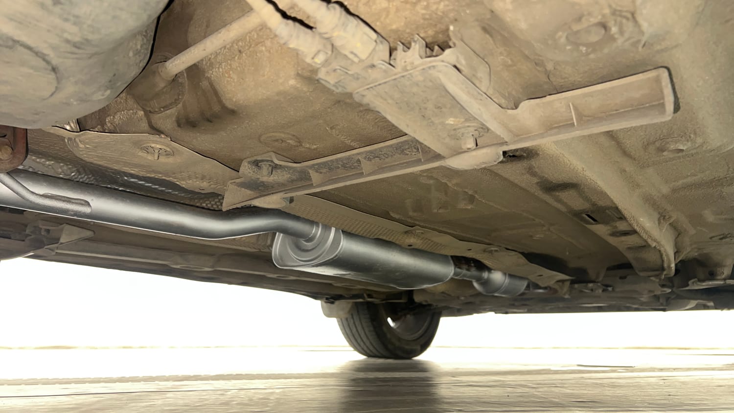 Used 2022 Volkswagen Taigun Topline 1.0 TSI AT Petrol Automatic extra REAR RIGHT UNDERBODY VIEW