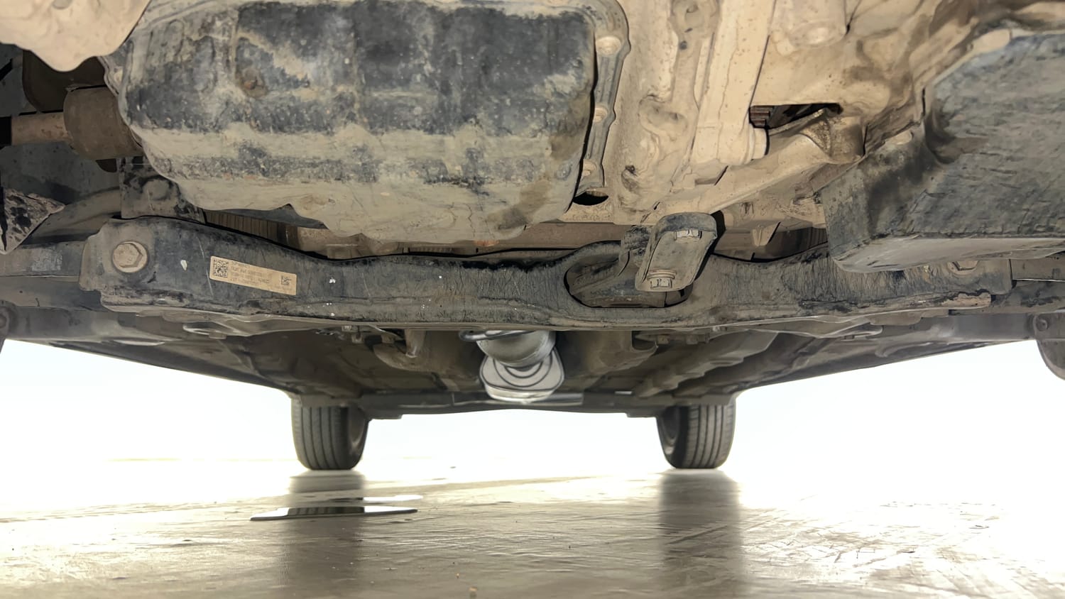 Used 2022 Volkswagen Taigun Topline 1.0 TSI AT Petrol Automatic extra FRONT LEFT UNDERBODY VIEW