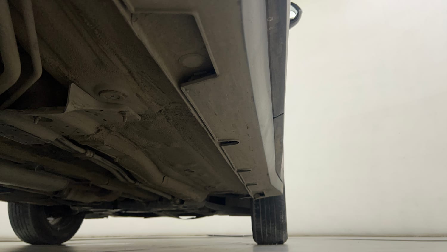 Used 2023 Kia Carens Prestige Plus 1.4 Petrol MT 7 STR Petrol Manual extra REAR RIGHT UNDERBODY VIEW
