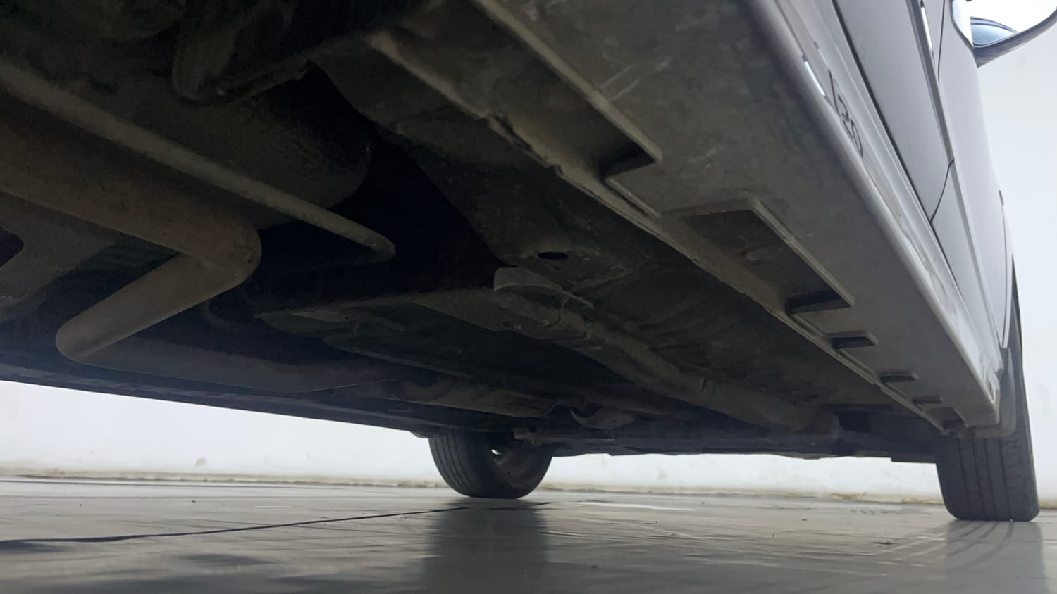 Used 2021 Hyundai New i20 Asta (O) 1.0 Turbo DCT Petrol Automatic extra REAR RIGHT UNDERBODY VIEW