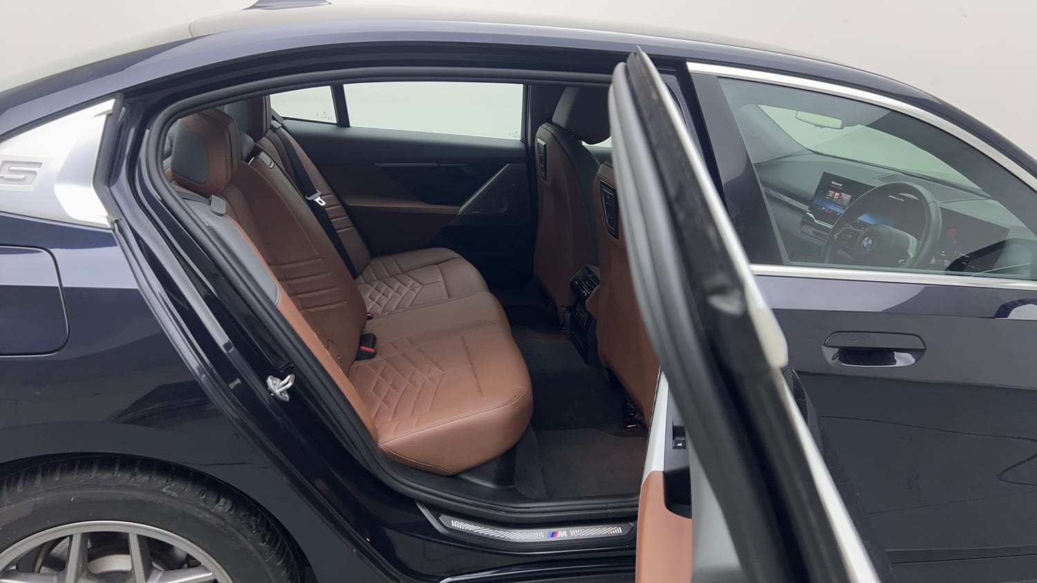 Used 2026 BMW 5 Series 530Li M Sport (Titanium Bronze) Petrol Automatic interior RIGHT SIDE REAR DOOR CABIN VIEW