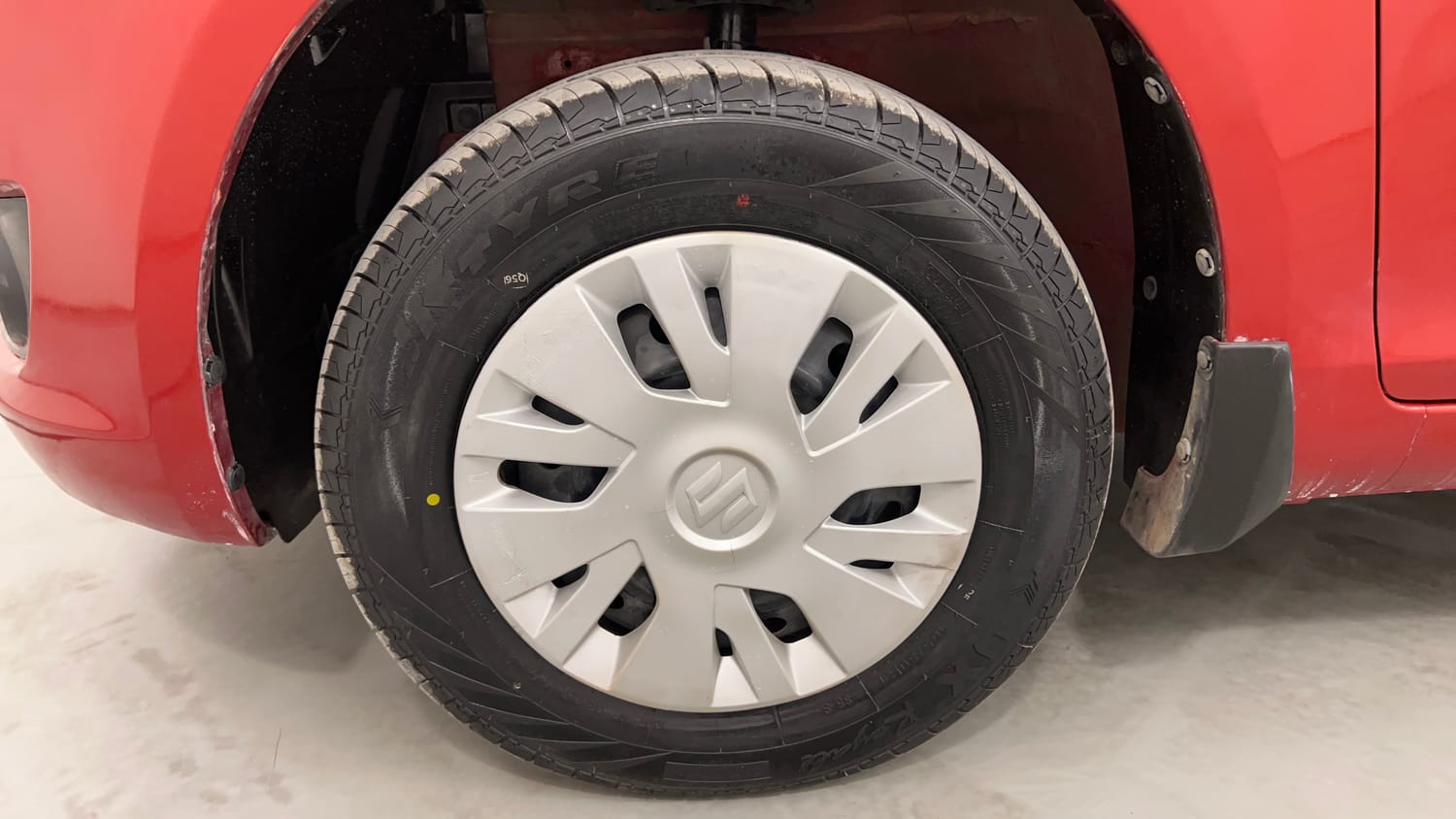 Used 2012 Maruti Suzuki Swift VXi Petrol Manual tyres LEFT FRONT TYRE RIM VIEW