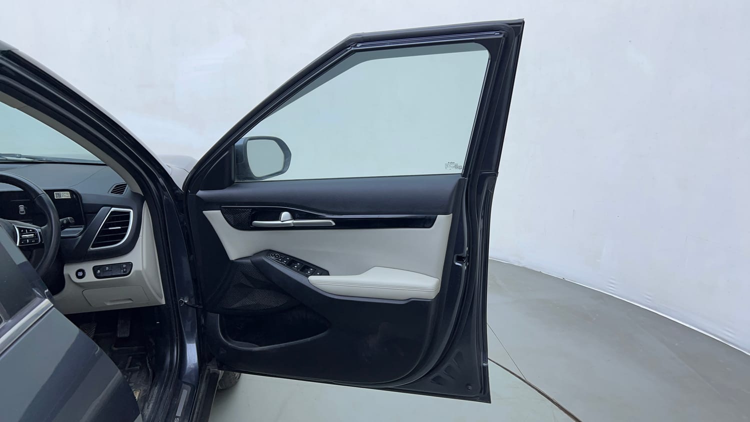 Used 2023 Kia Seltos HTX 1.5 Petrol MT Petrol Manual interior RIGHT FRONT DOOR OPEN VIEW