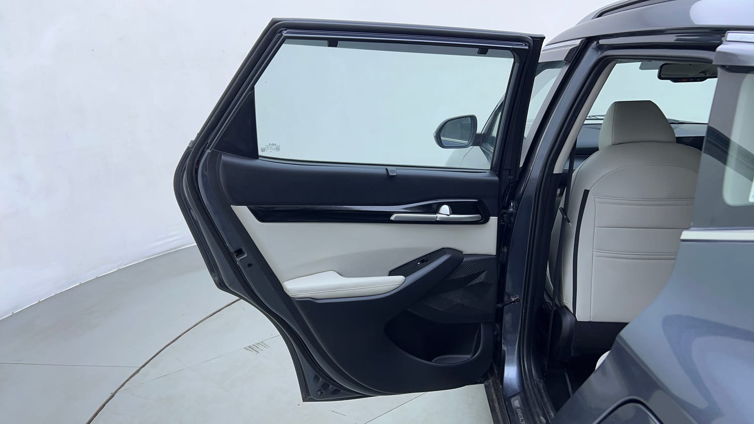 Used 2023 Kia Seltos HTX 1.5 Petrol MT Petrol Manual interior LEFT REAR DOOR OPEN VIEW