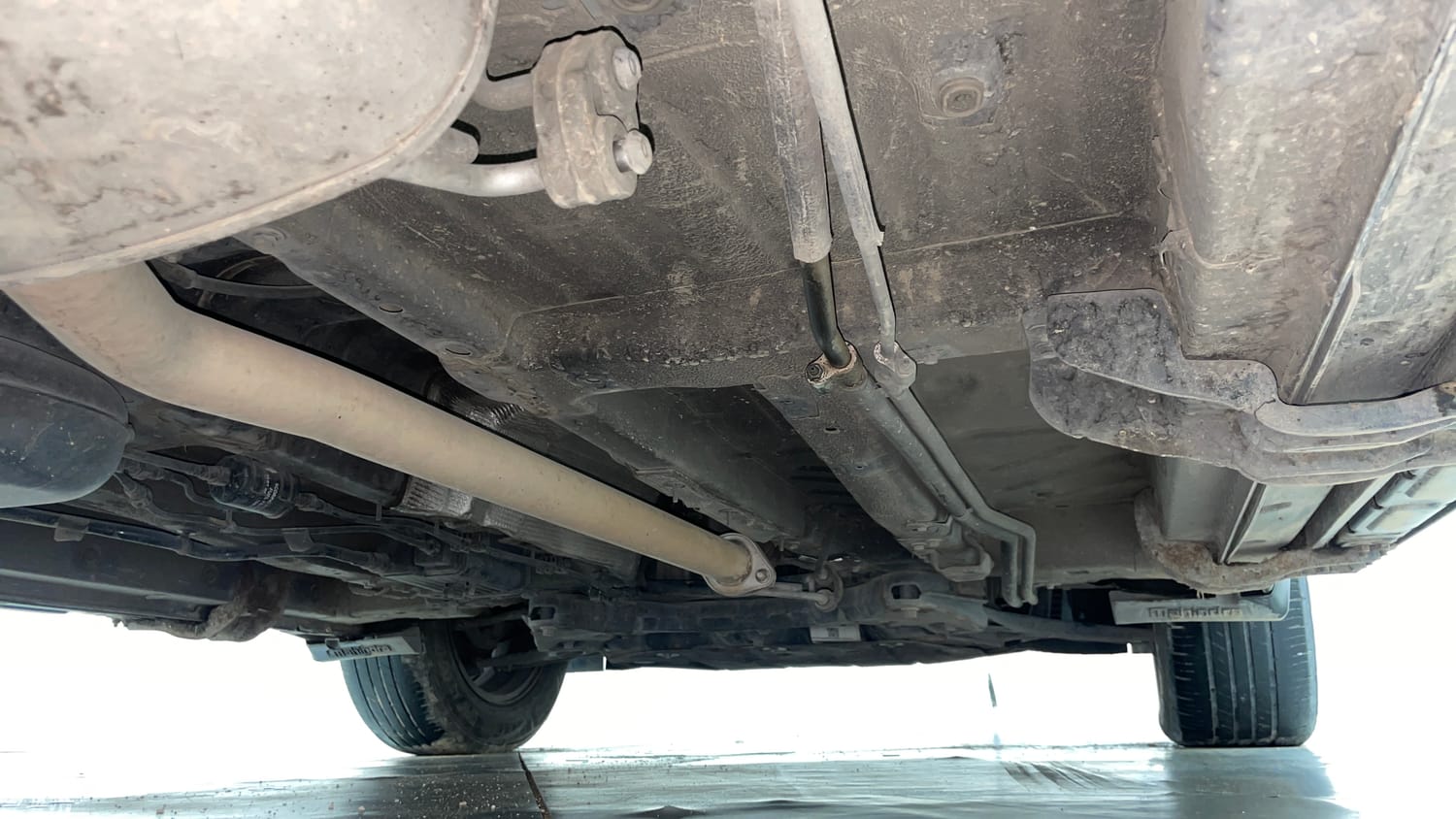 Used 2022 Mahindra XUV700 AX 5 Petrol MT 7 STR Petrol Manual extra REAR RIGHT UNDERBODY VIEW