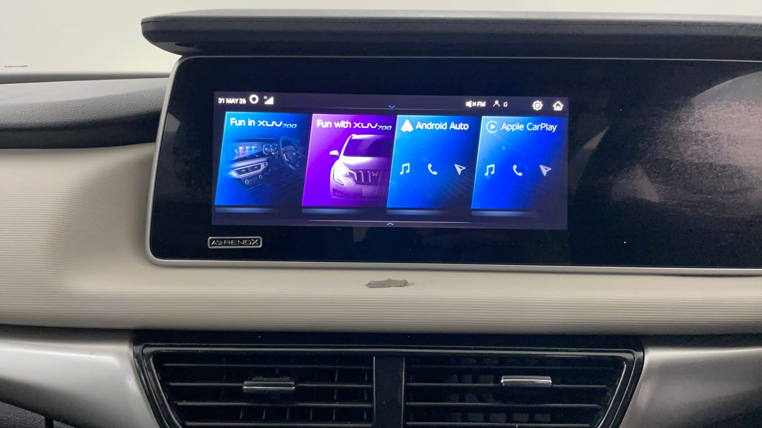 Used 2022 Mahindra XUV700 AX 5 Petrol MT 7 STR Petrol Manual top_features Integrated (in-dash) music system