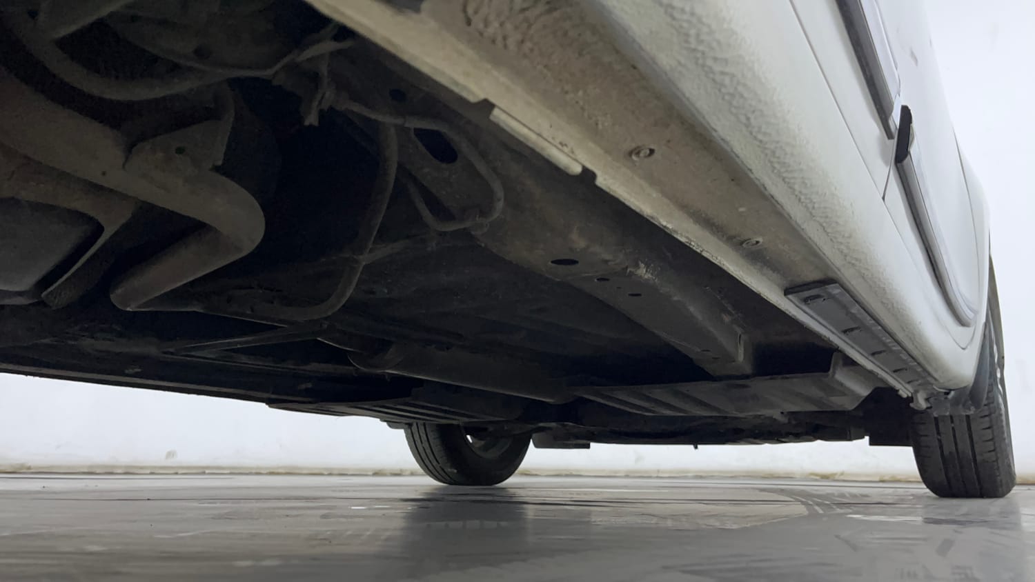 Used 2024 Maruti Suzuki Dzire ZXi Plus AGS Petrol Automatic extra REAR RIGHT UNDERBODY VIEW
