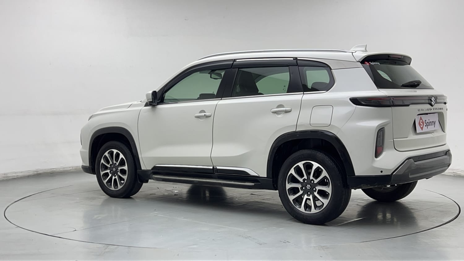 Used 2023 Maruti Suzuki Grand Vitara Alpha Plus Intelligent Hybrid eCVT Hybrid Automatic exterior LEFT REAR CORNER VIEW