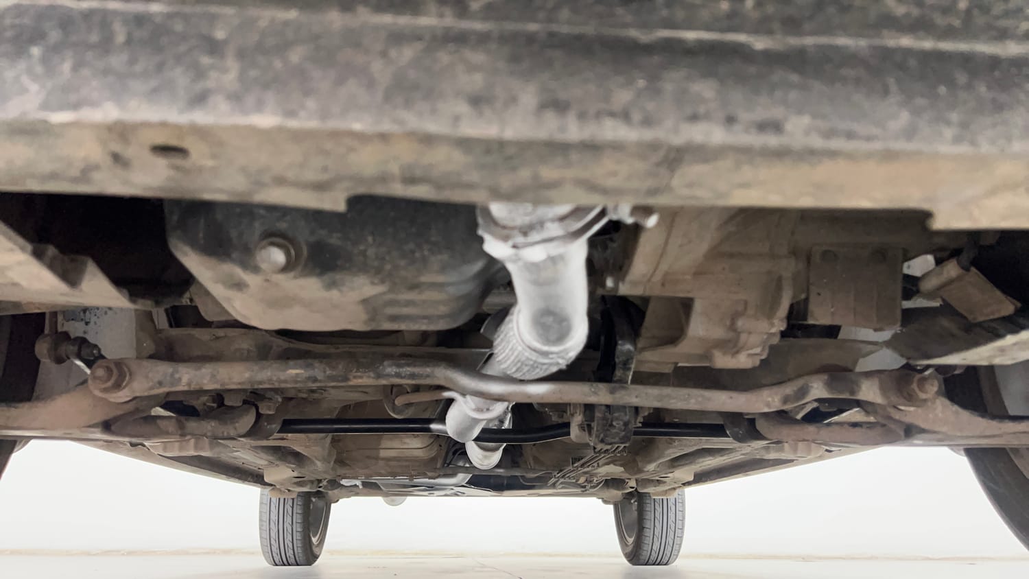 Used 2018 Tata Tigor Revotron XZA Petrol Automatic extra FRONT LEFT UNDERBODY VIEW