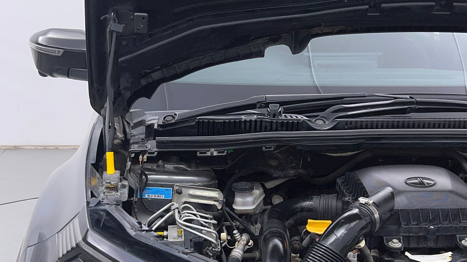 Used 2023 Tata Nexon Fearless Plus S 1.2 Revotron Petrol 7DCA DT Petrol Automatic engine ENGINE RIGHT SIDE HINGE & APRON VIEW