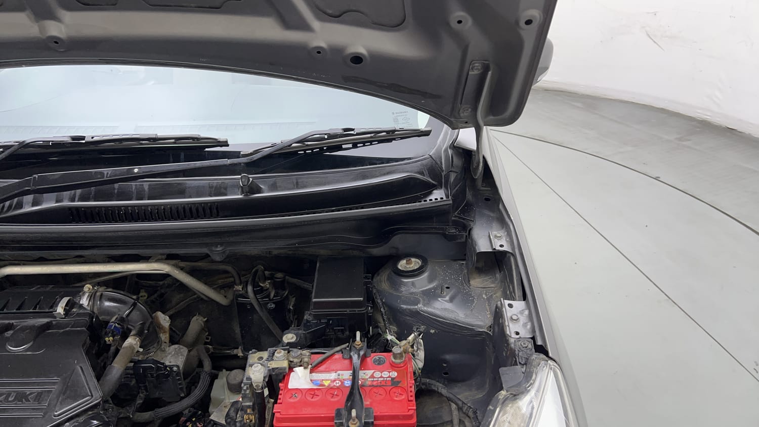 Used 2018 Maruti Suzuki Celerio ZXi (O) AMT Petrol Automatic engine ENGINE LEFT SIDE HINGE & APRON VIEW