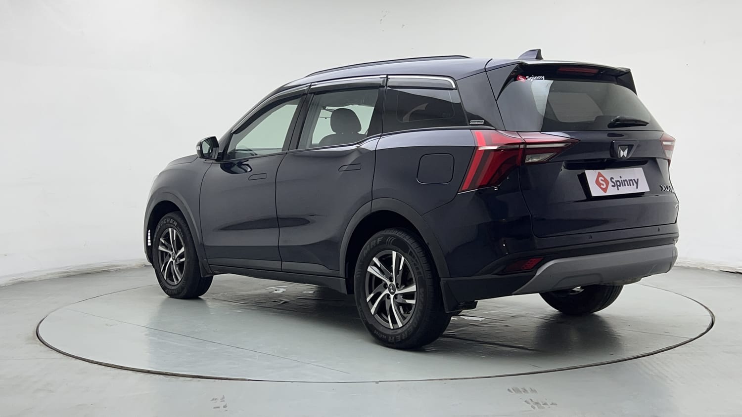 Used 2024 Mahindra XUV700 AX 5 Petrol MT 5 STR Petrol Manual exterior LEFT REAR CORNER VIEW