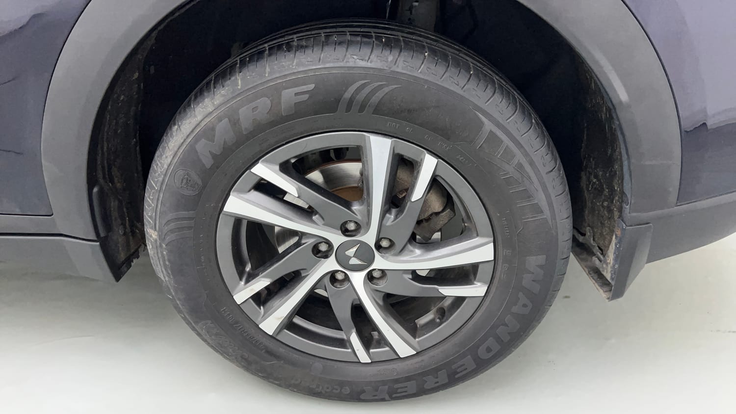 Used 2024 Mahindra XUV700 AX 5 Petrol MT 5 STR Petrol Manual tyres LEFT REAR TYRE RIM VIEW