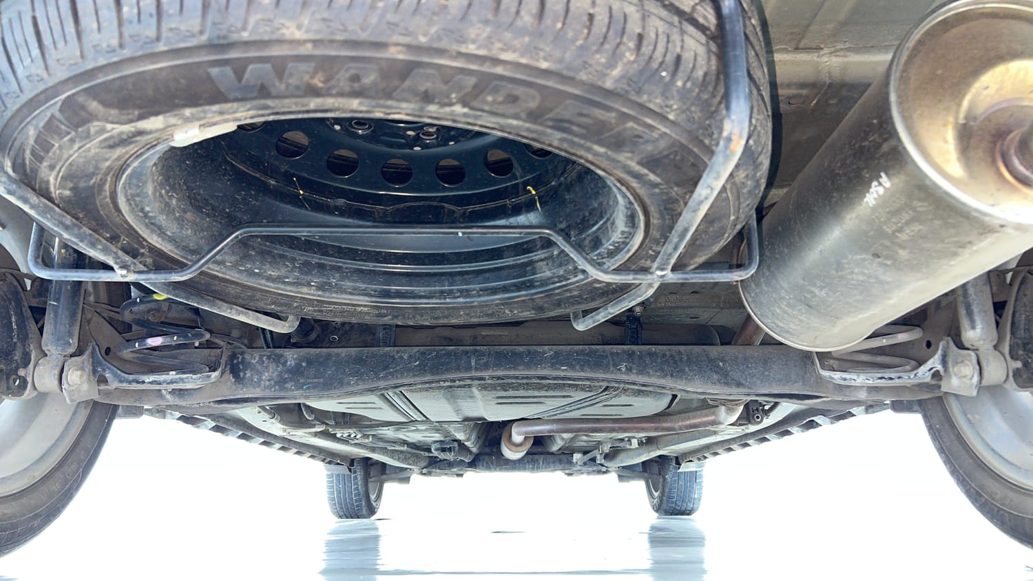 Used 2024 Maruti Suzuki XL6 Alpha MT Petrol Petrol Manual extra REAR UNDERBODY VIEW (TAKEN FROM REAR)