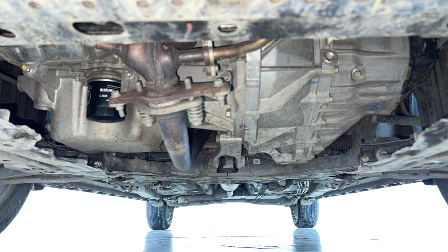 Used 2024 Maruti Suzuki XL6 Alpha MT Petrol Petrol Manual extra FRONT LEFT UNDERBODY VIEW