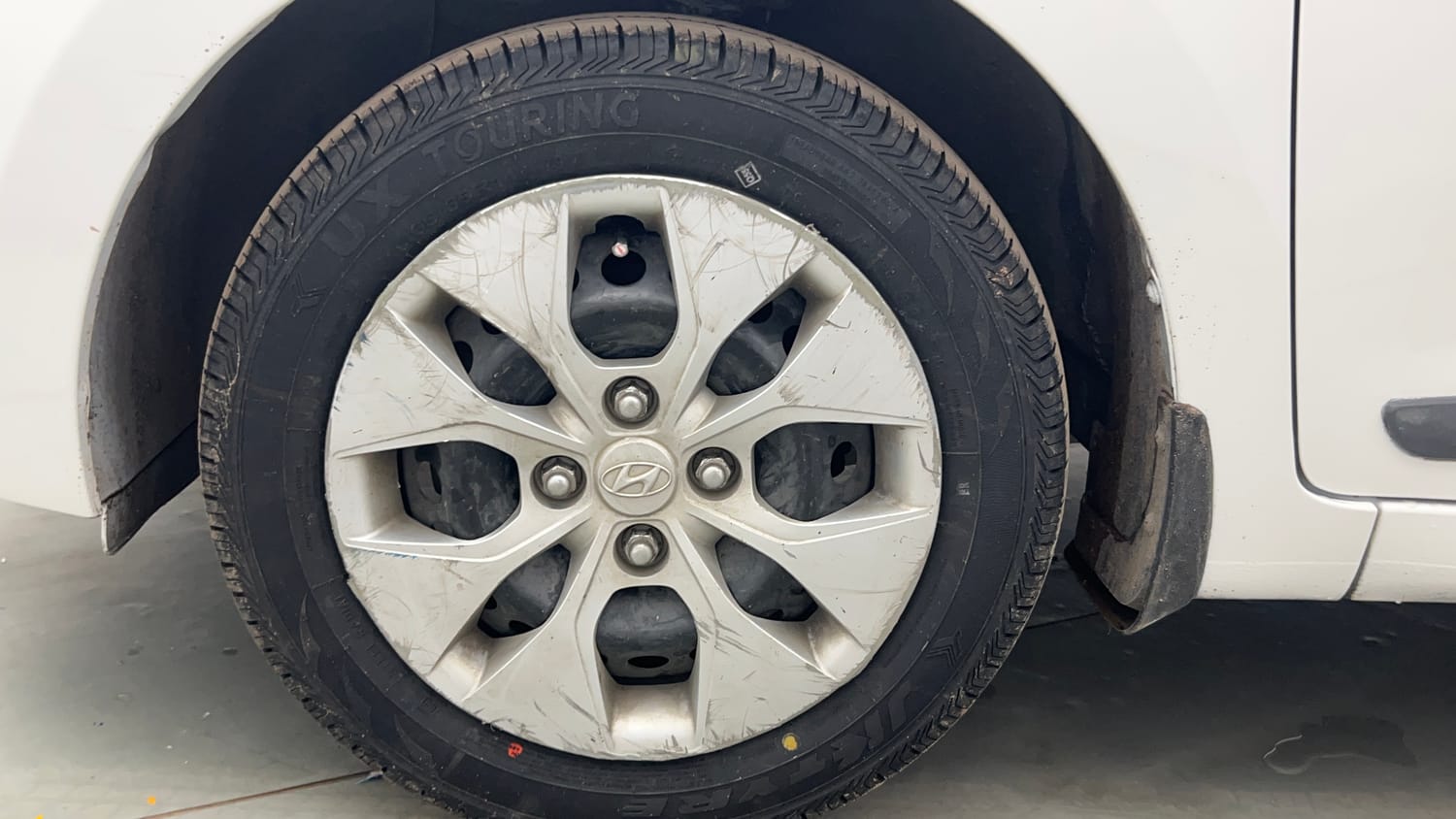 Used 2014 Hyundai Xcent S 1.2 Petrol Manual tyres LEFT FRONT TYRE RIM VIEW