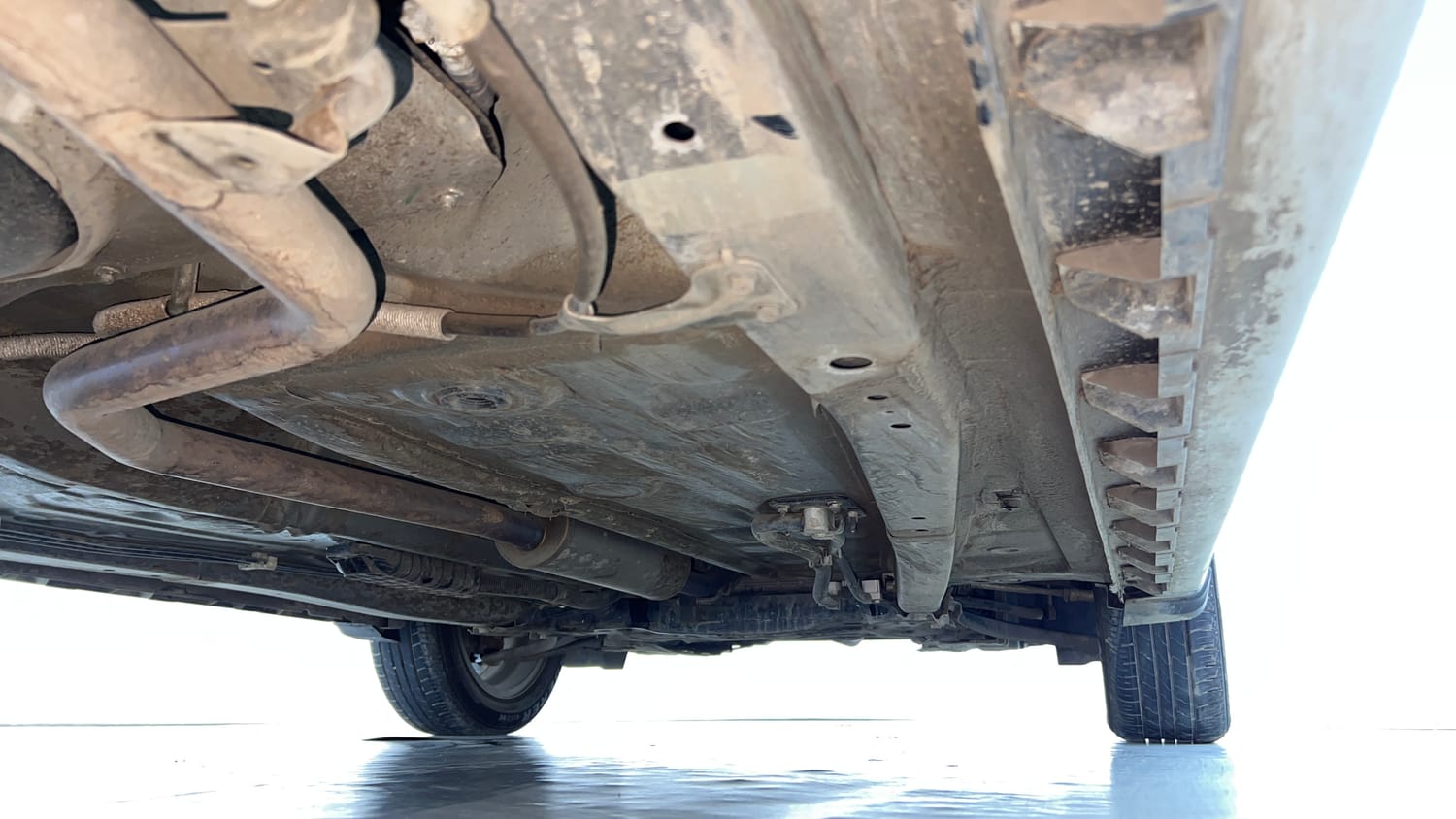 Used 2024 Maruti Suzuki XL6 Alpha MT Petrol Petrol Manual extra REAR RIGHT UNDERBODY VIEW