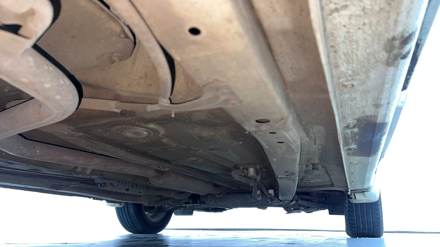 Used 2024 Maruti Suzuki Ertiga ZXi Plus AT Petrol Automatic extra REAR RIGHT UNDERBODY VIEW