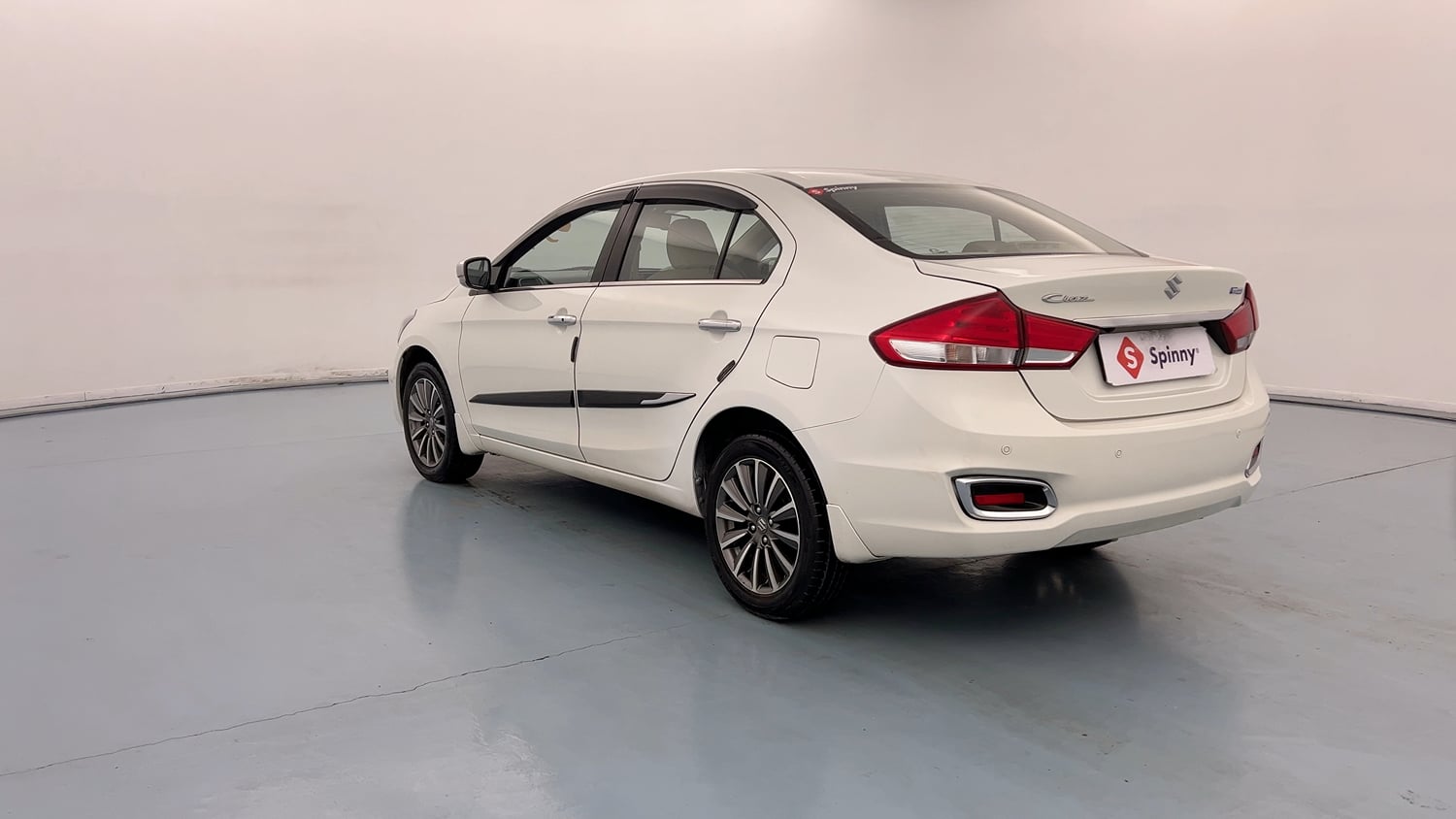 Used 2023 Maruti Suzuki Ciaz Alpha 1.5 Petrol Manual exterior LEFT REAR CORNER VIEW