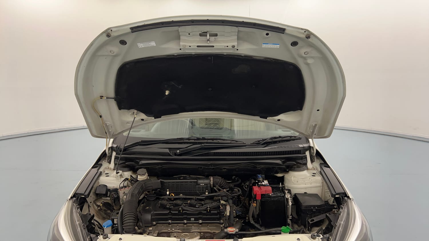 Used 2023 Maruti Suzuki Ciaz Alpha 1.5 Petrol Manual engine ENGINE & BONNET OPEN FRONT VIEW