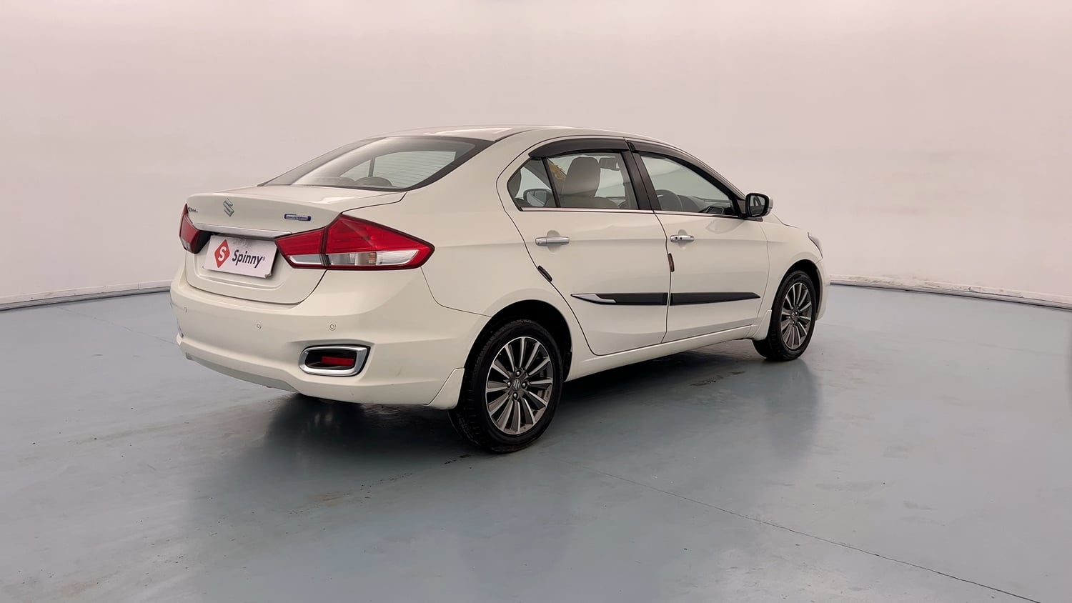 Used 2023 Maruti Suzuki Ciaz Alpha 1.5 Petrol Manual exterior RIGHT REAR CORNER VIEW