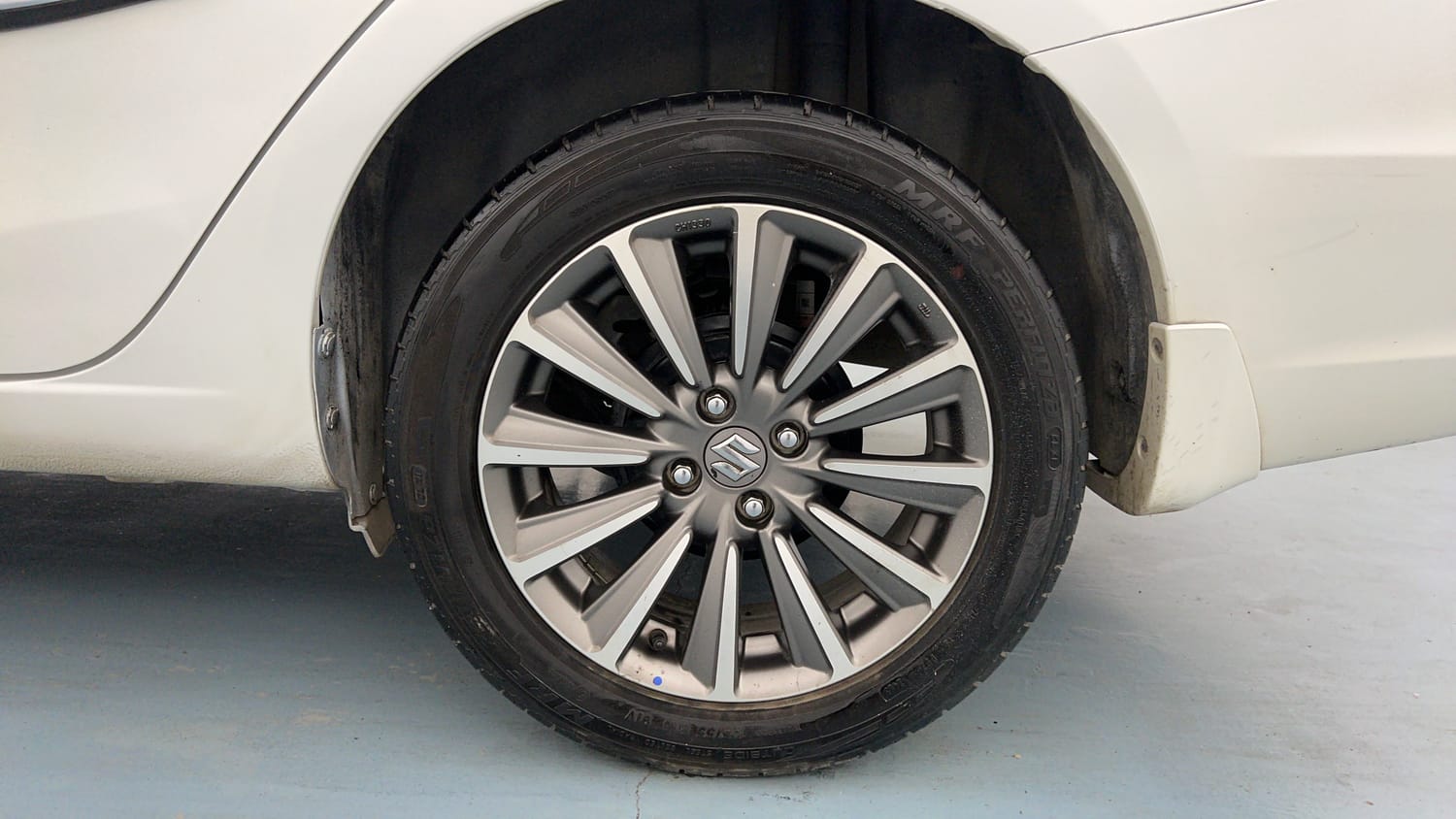 Used 2023 Maruti Suzuki Ciaz Alpha 1.5 Petrol Manual tyres LEFT REAR TYRE RIM VIEW