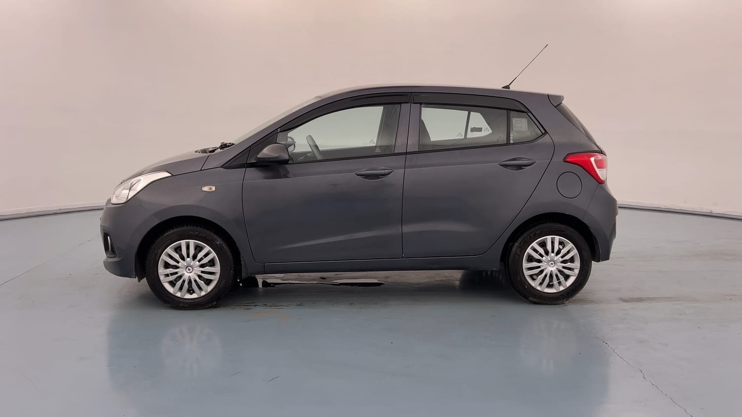 Used 2014 Hyundai Grand i10 Magna 1.2 Kappa VTVT Petrol Manual exterior LEFT SIDE VIEW