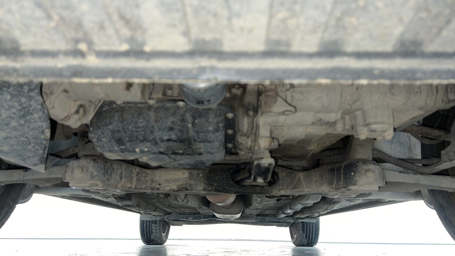 Used 2023 Volkswagen Virtus Topline 1.0 TSI MT Petrol Manual extra FRONT LEFT UNDERBODY VIEW