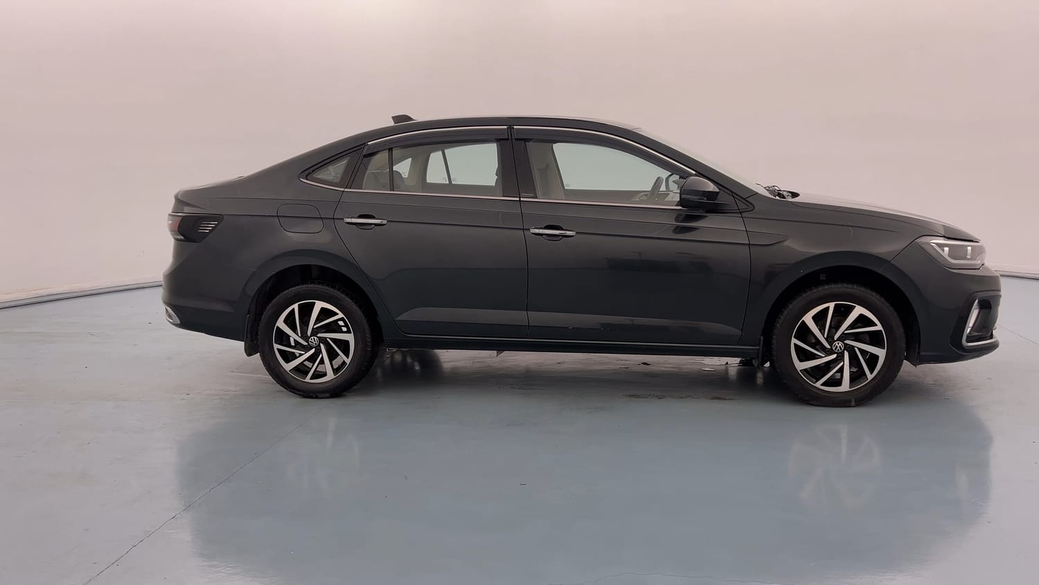 Used 2023 Volkswagen Virtus Topline 1.0 TSI MT Petrol Manual exterior RIGHT SIDE VIEW