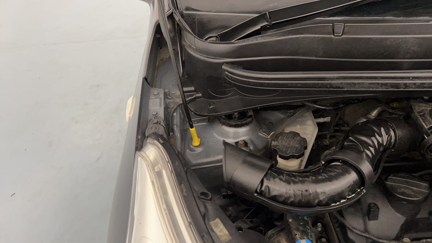 Used 2014 Hyundai Grand i10 Magna 1.2 Kappa VTVT Petrol Manual engine ENGINE RIGHT SIDE HINGE & APRON VIEW