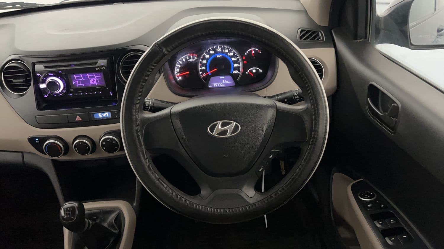 Used 2014 Hyundai Grand i10 Magna 1.2 Kappa VTVT Petrol Manual interior STEERING VIEW