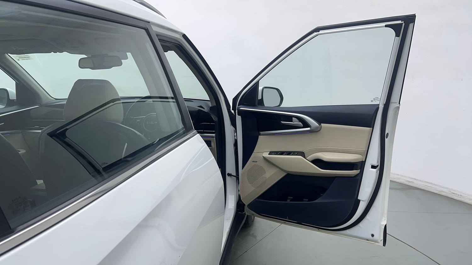 Used 2023 Kia Carens Luxury Plus 1.5 Diesel iMT 7 STR Diesel Manual interior RIGHT FRONT DOOR OPEN VIEW