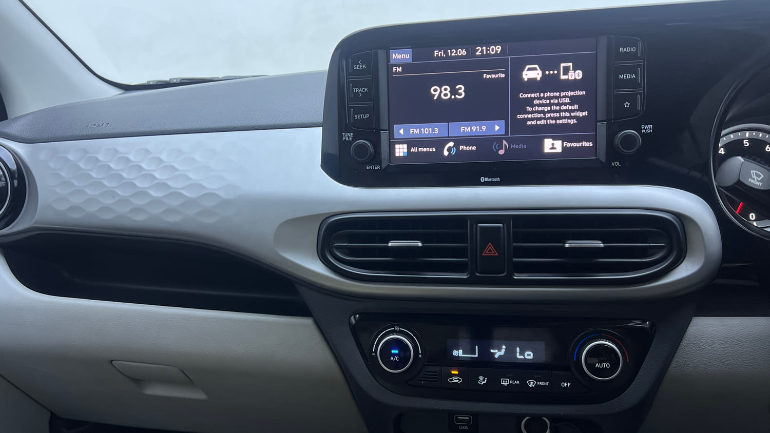 Used 2022 Hyundai Grand i10 Nios Sportz 1.2 Kappa VTVT Petrol Manual interior MUSIC SYSTEM & AC CONTROL VIEW