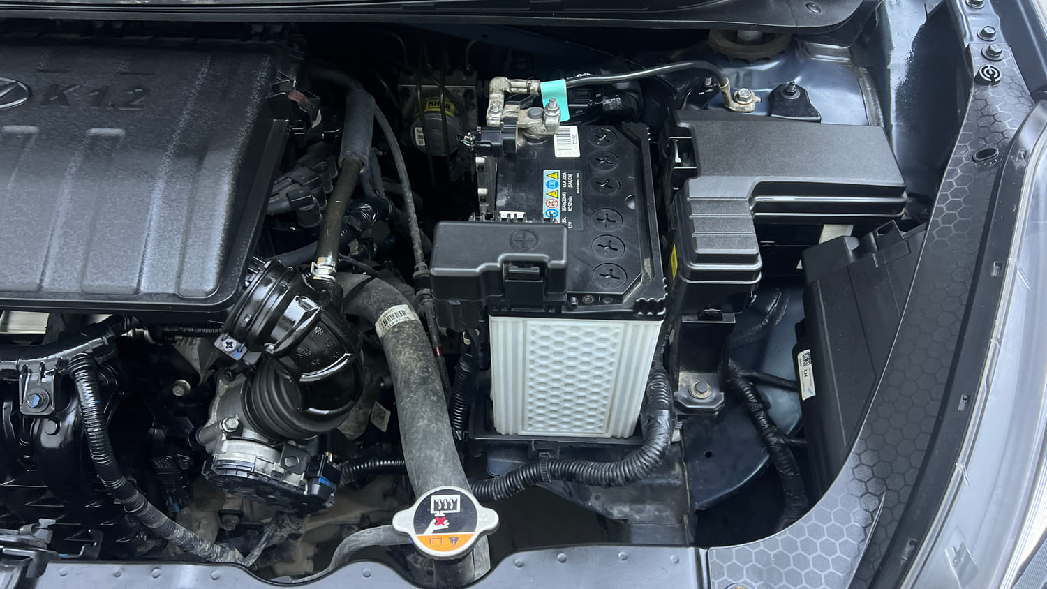Used 2022 Hyundai Grand i10 Nios Sportz 1.2 Kappa VTVT Petrol Manual engine ENGINE LEFT SIDE VIEW