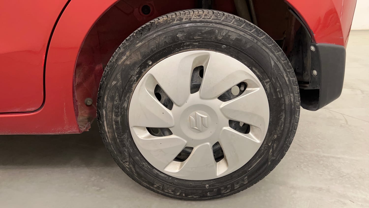 Used 2014 Maruti Suzuki Celerio VXi AMT Petrol Automatic tyres LEFT REAR TYRE RIM VIEW