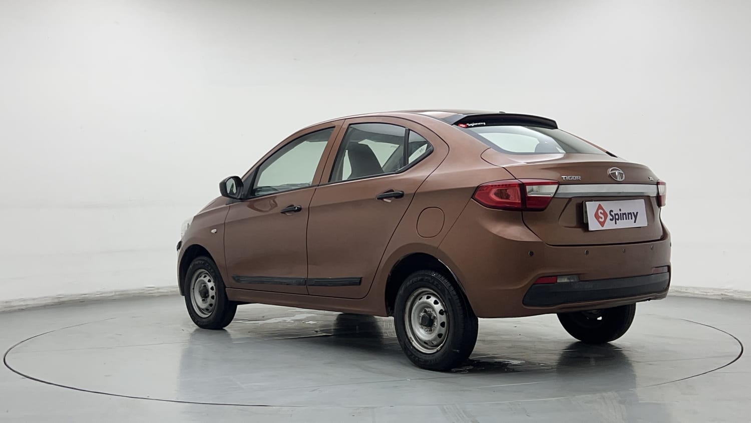 Used 2018 Tata Tigor Revotron XE Petrol Manual exterior LEFT REAR CORNER VIEW