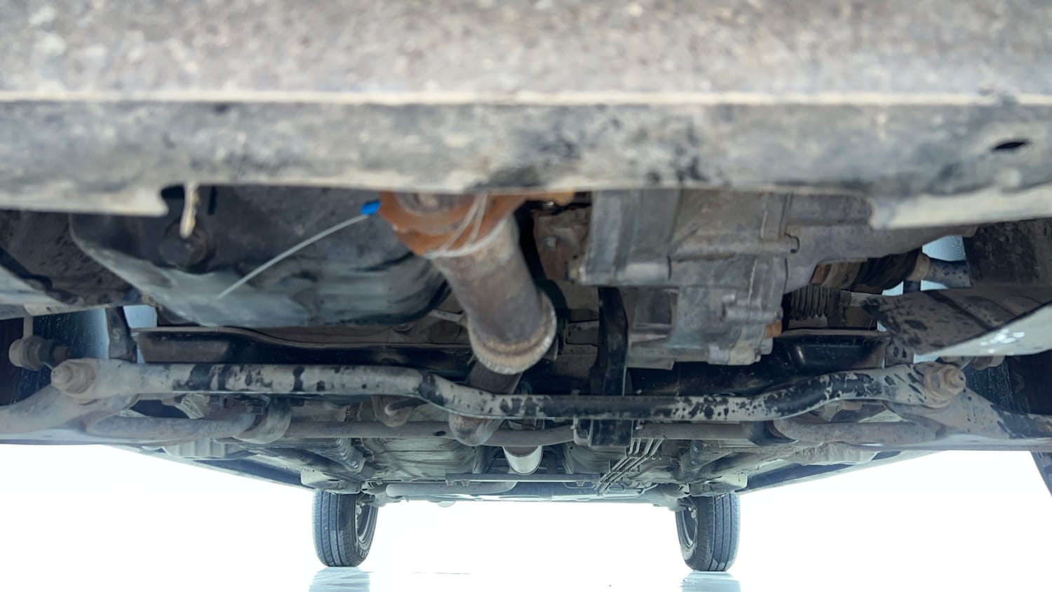 Used 2018 Tata Tigor Revotron XE Petrol Manual extra FRONT LEFT UNDERBODY VIEW