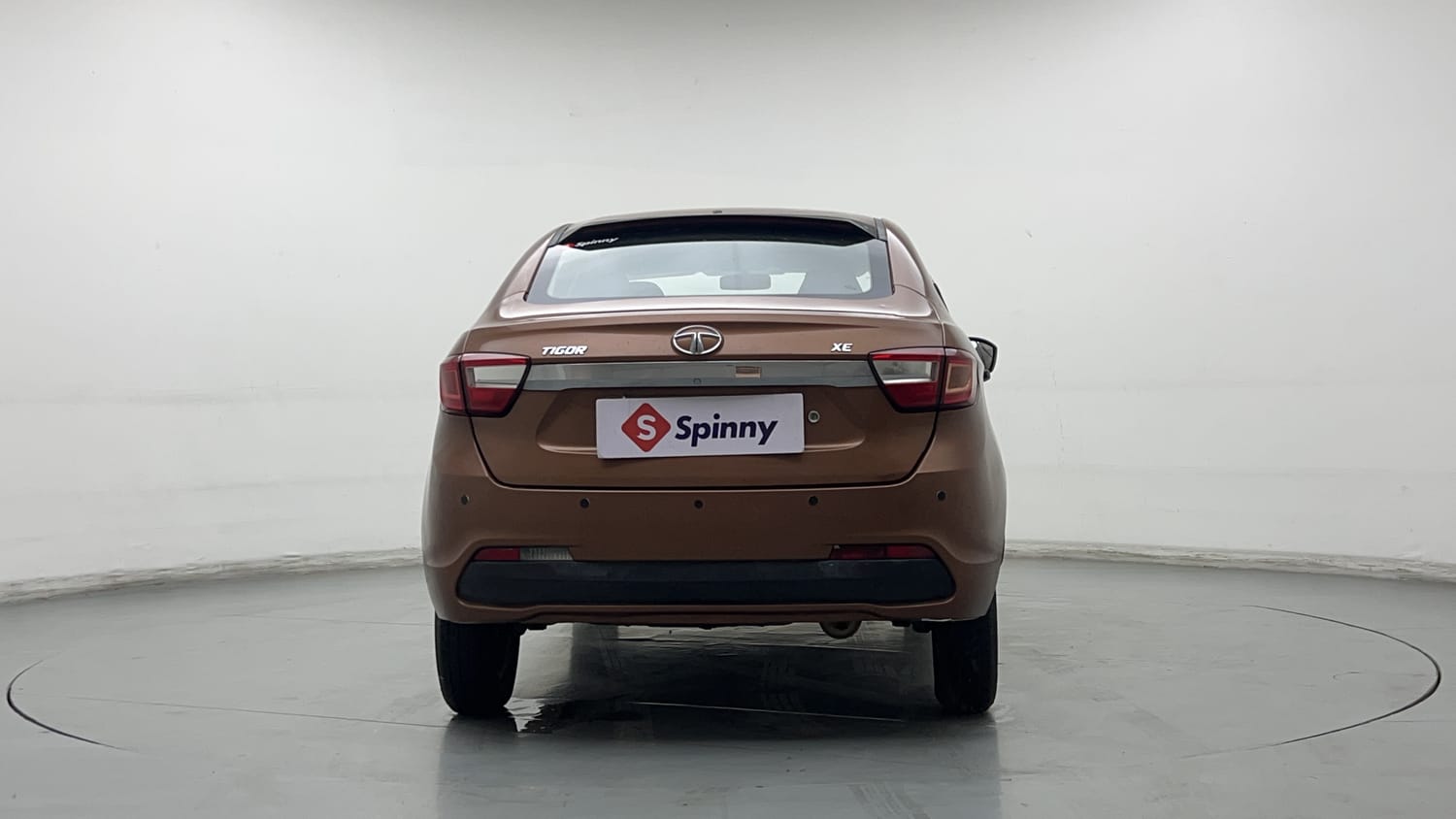 Used 2018 Tata Tigor Revotron XE Petrol Manual exterior BACK VIEW