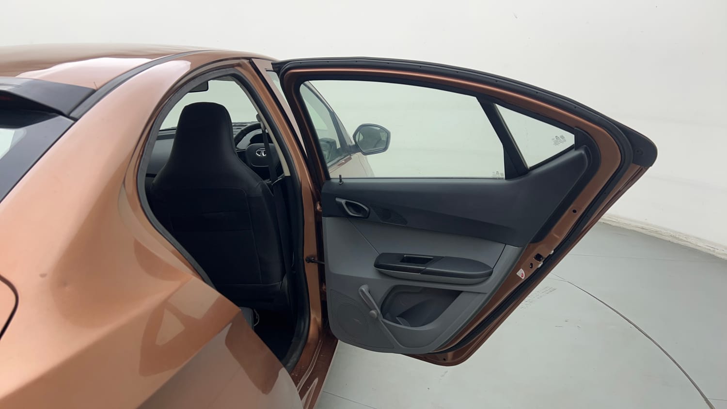 Used 2018 Tata Tigor Revotron XE Petrol Manual interior RIGHT REAR DOOR OPEN VIEW