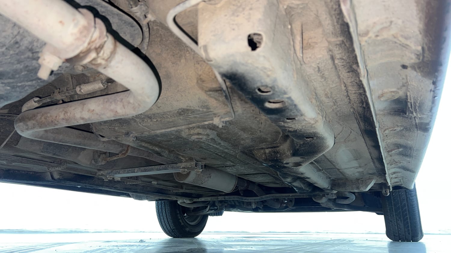 Used 2018 Tata Tigor Revotron XE Petrol Manual extra REAR RIGHT UNDERBODY VIEW