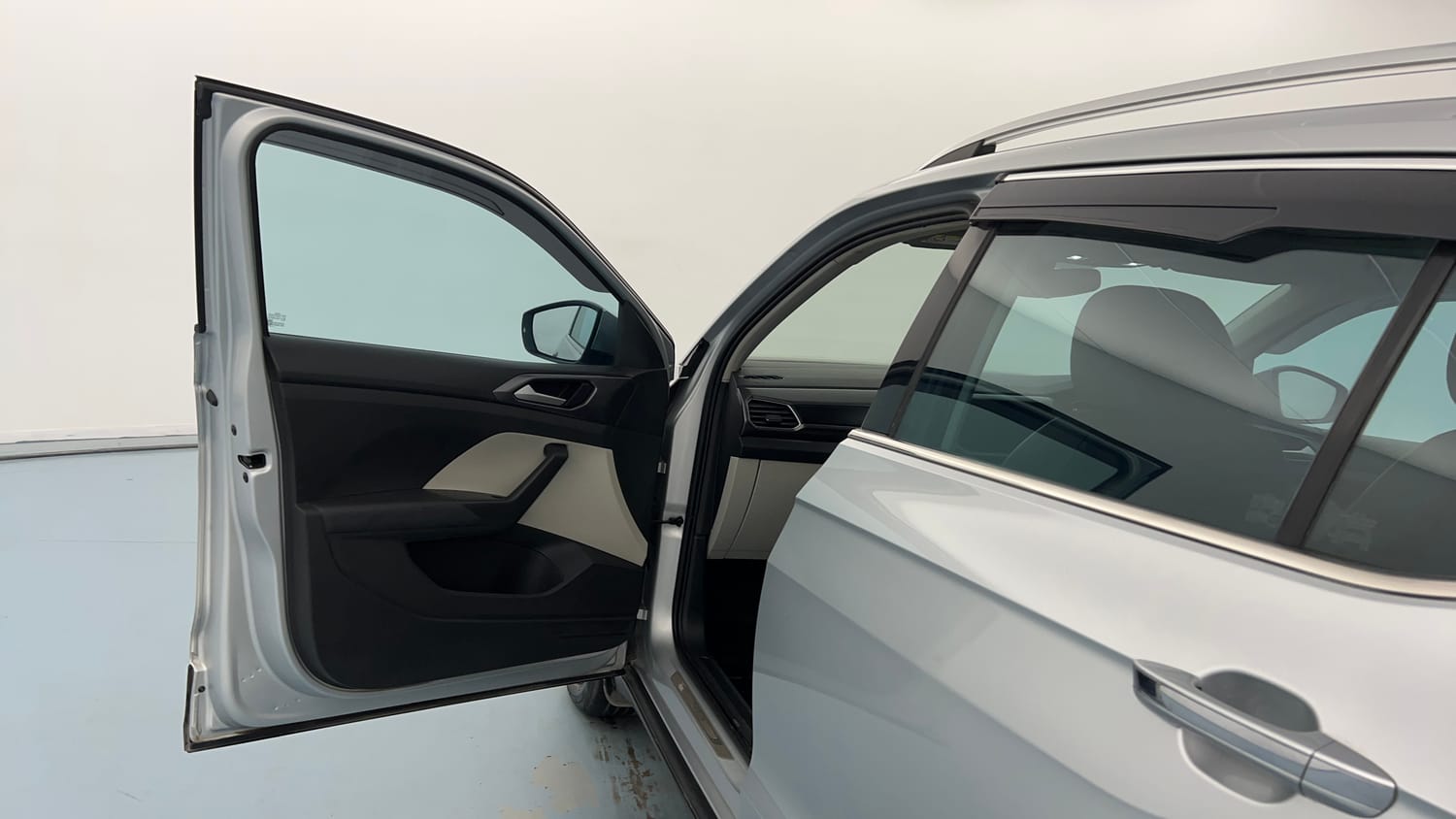 Used 2025 Volkswagen Taigun Topline 1.0 TSI AT Petrol Automatic interior LEFT FRONT DOOR OPEN VIEW