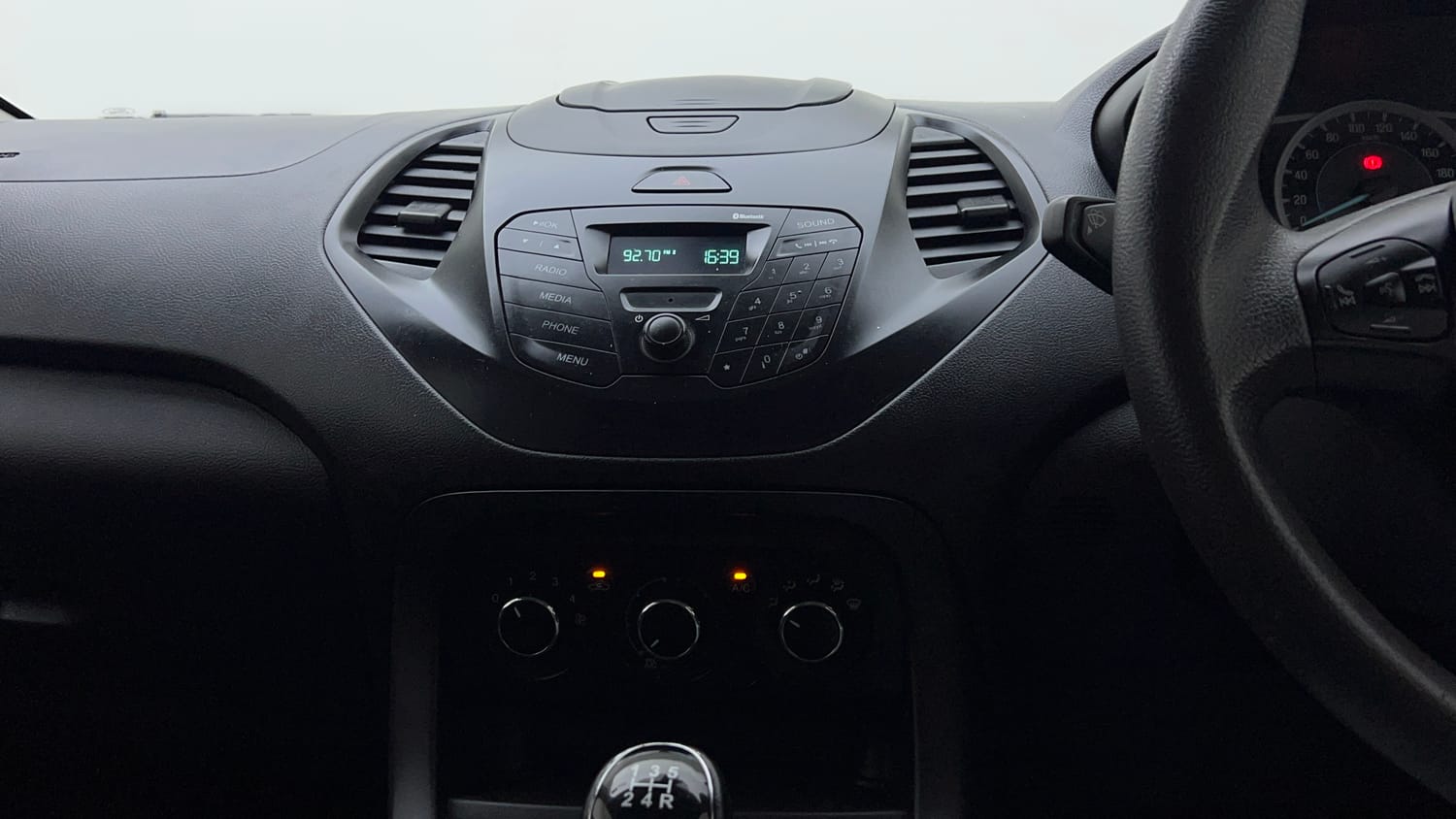 Used 2017 Ford Figo Trend 1.2 Ti-VCT Petrol Manual interior MUSIC SYSTEM & AC CONTROL VIEW